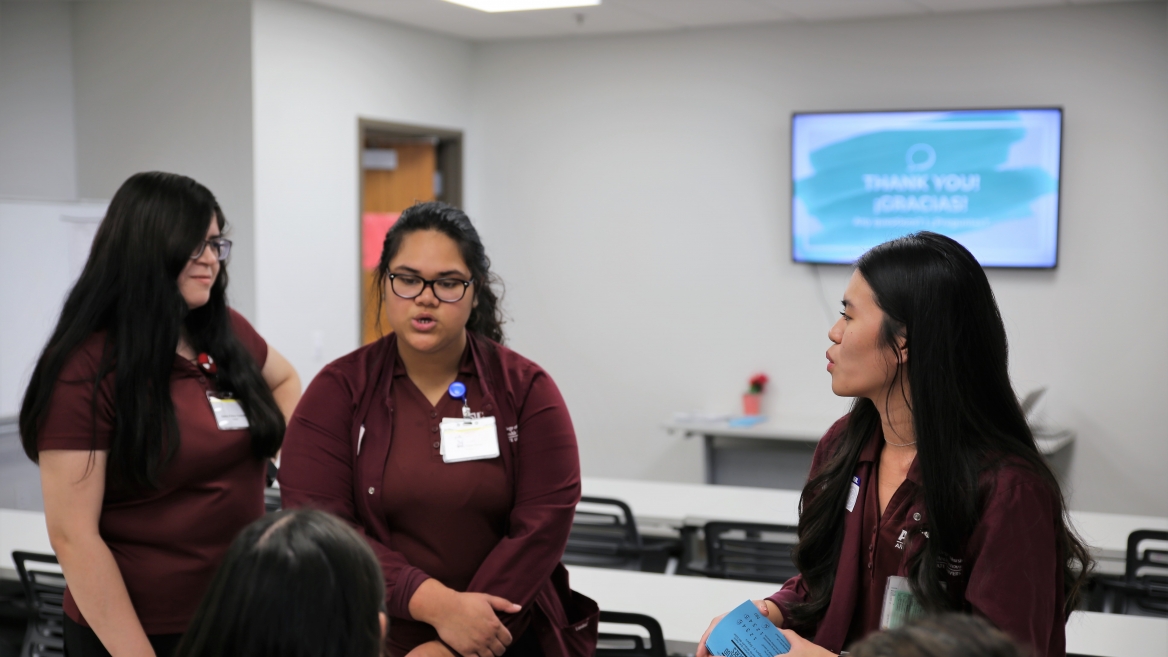 Edson College of Nursing and Health Innovation Students answer questions after a workshop at St. Vincent de Paul in Phoenix