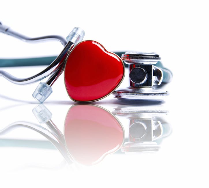 stethoscope and heart pin